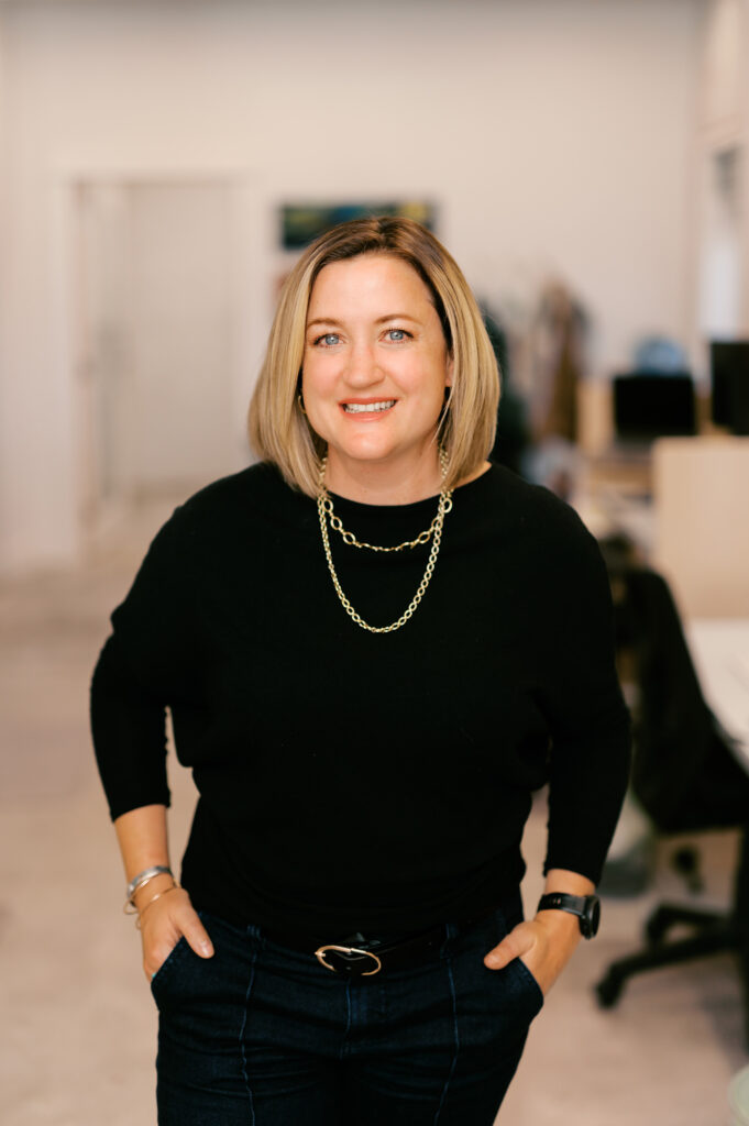 Portrait of Maddie Miller in office